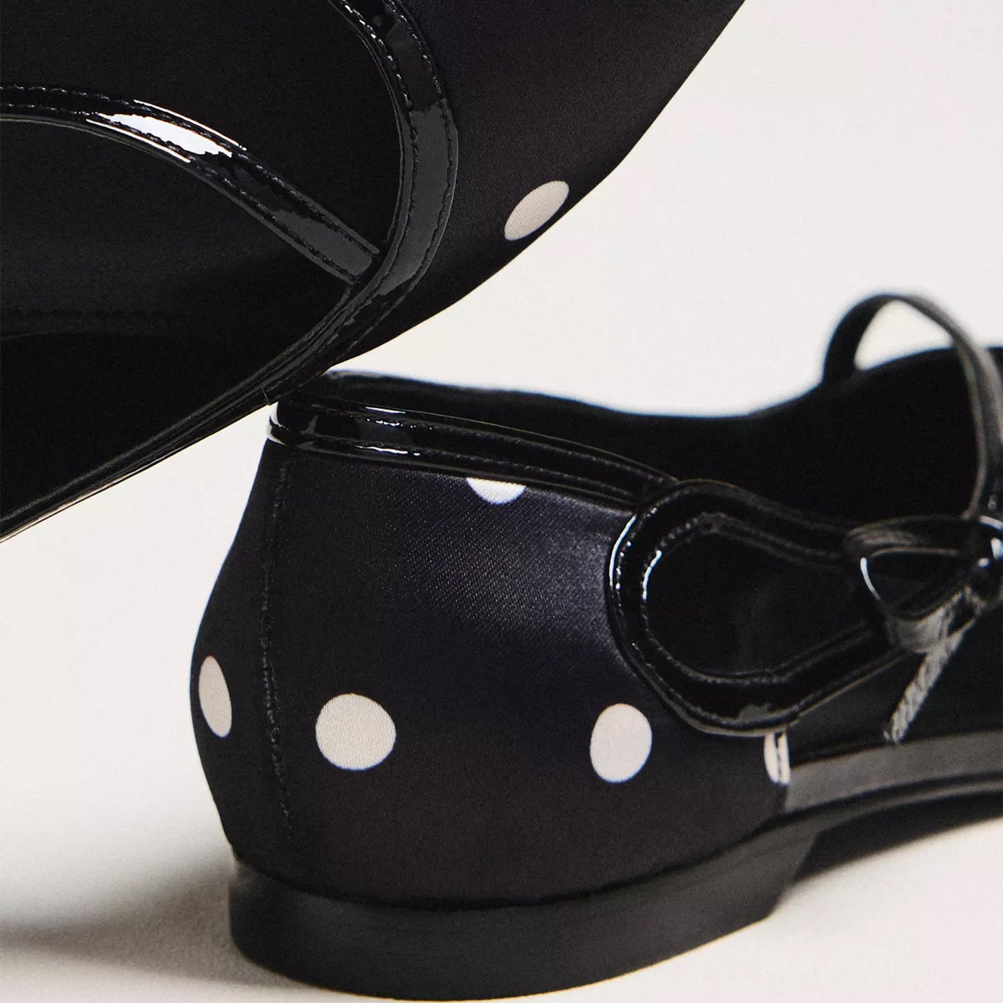 Black Patent Satin Pointed-Toe Side-Strap Bow Flats.