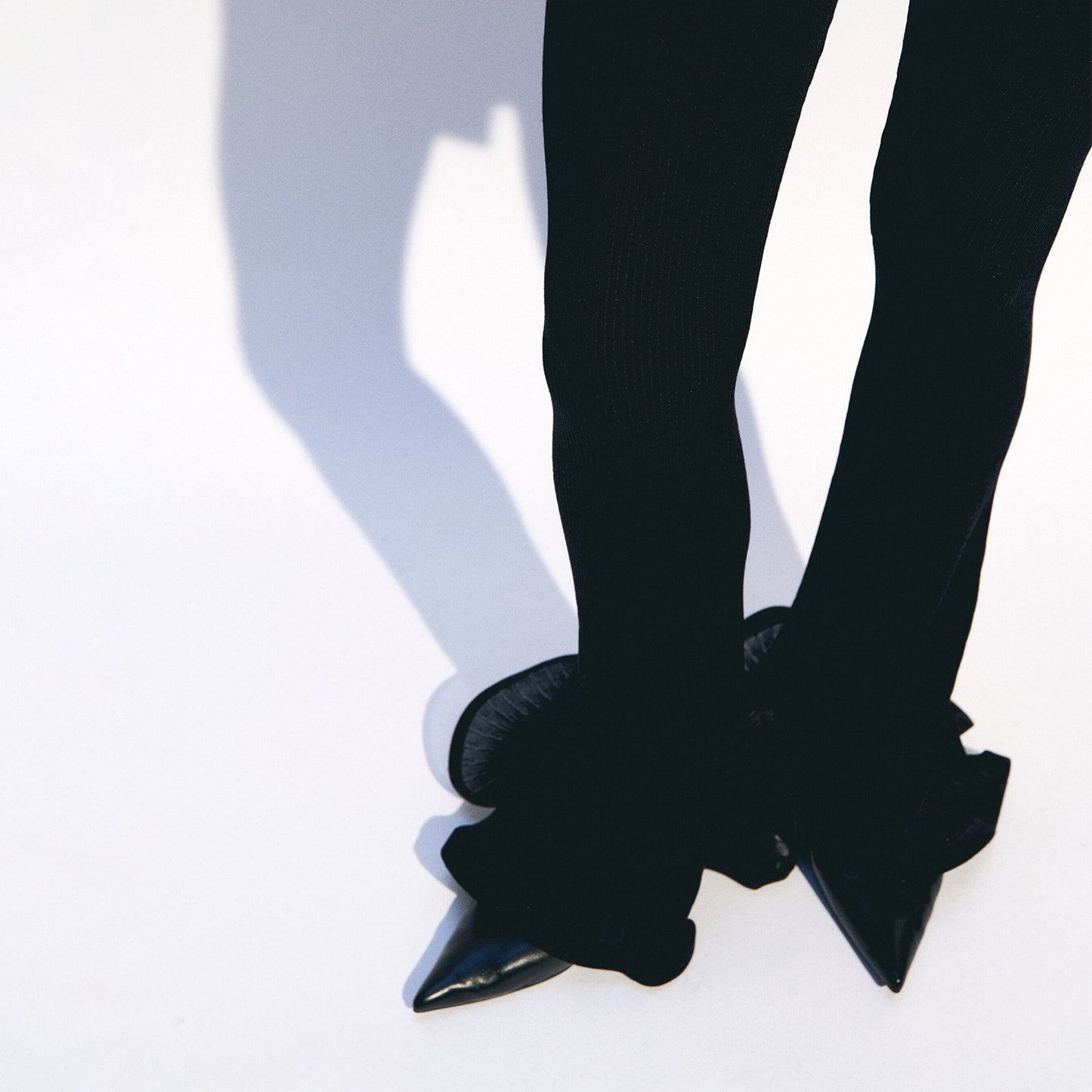 Black Pointed-Toe Slingback Slip-On Flats