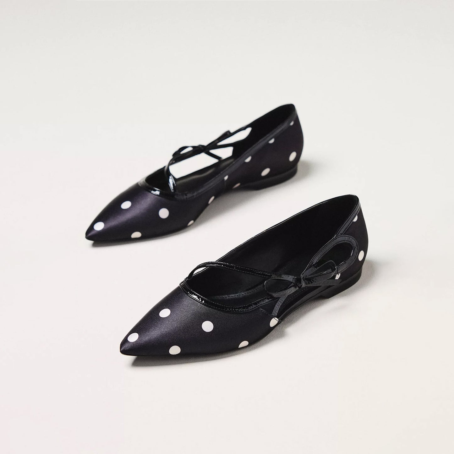 Black Patent Satin Pointed-Toe Side-Strap Bow Flats.