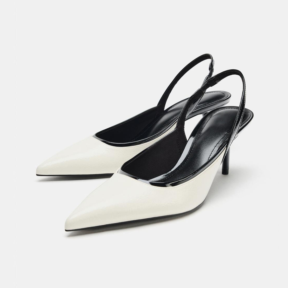 Ivory Pointed-Toe Chic Black Back Strap Kitten Heels